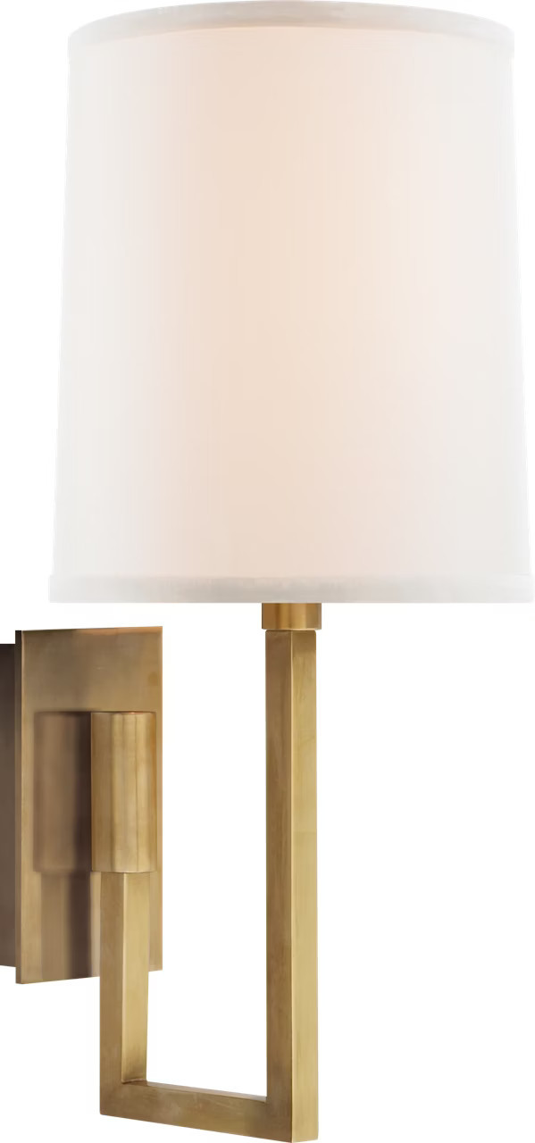 Visual Comfort Aspect library sconce in soft brass with ivory linen shade