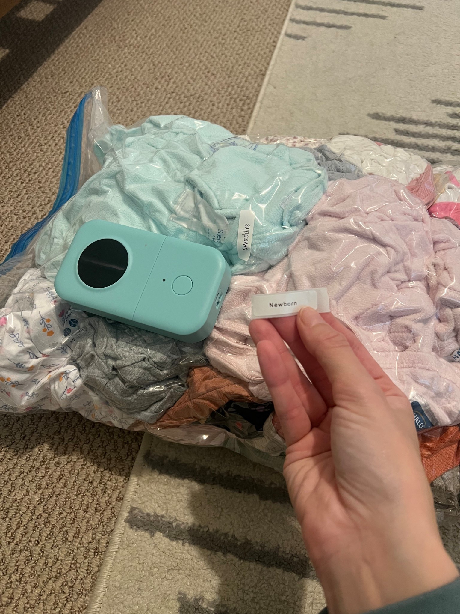Packing up newborn clothes is a whole feeling! Obsessed with these vacuum bags and label maker! 

#LTKHome #LTKmomlife #LTKKids