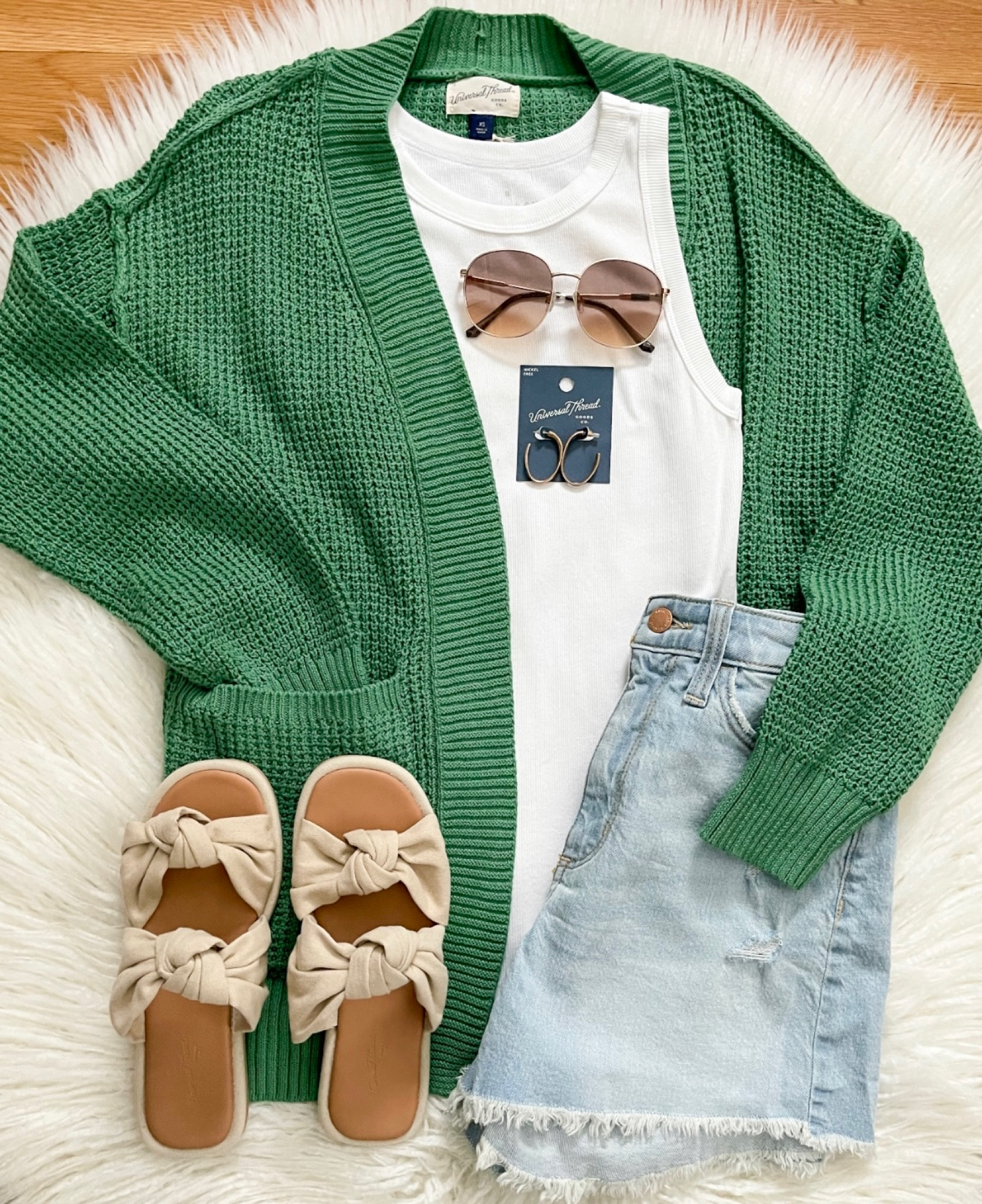 Sharing this gorgeous cardigan now available in green!  The perfect pop of color to carry you into spring! 🌺 Paired it with this popular tank, new cut off jeans shorts & new sandals!  Everything here is linked for you in my bio & stories!  Have a great night! 💚 

#LTKshoecrush #LTKstyletip #LTKunder50