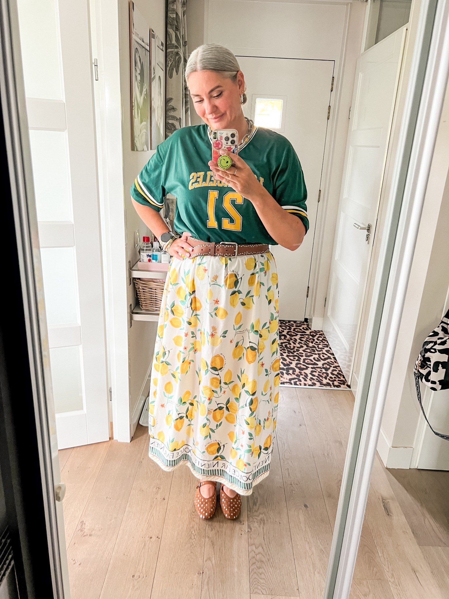 Ootd - Sunday. A bottle green sport jersey paired with a lemon print midi skirt, brown belt and brown studded Mary Jane flats. 



#LTKnederlands #LTKsummer #LTKeurope