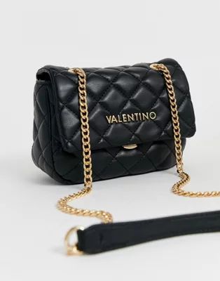 Valentino Bags Ocarina quilted cross body bag with chain strap in black | ASOS (Global)
