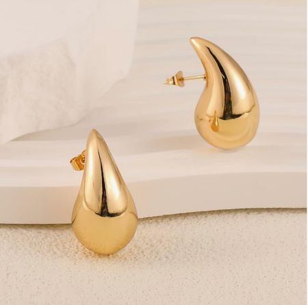 Gold earrings teeming accessories 

#LTKstyletip