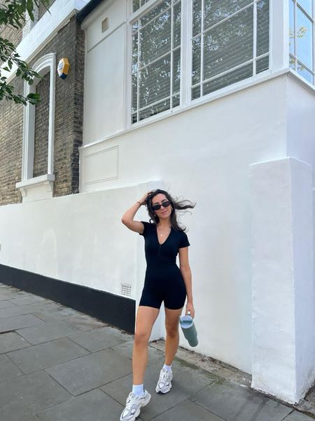 Black unitard, zip front, new balance 9060, spring outfit, spring trainers, green Stanley cup, summer styling, casual outfit, day time outfit, simple outfit 

#LTKspring #LTKstyletip #LTKuk