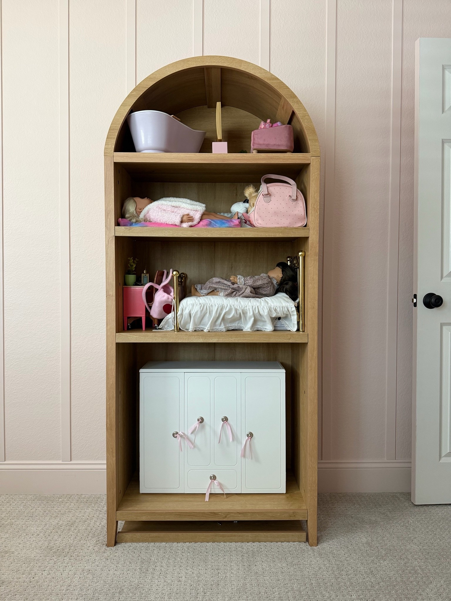 Arched bookcase perfect for a little girls’ room — and it’s on sale!

#LTKHome #LTKSaleAlert #LTKKids