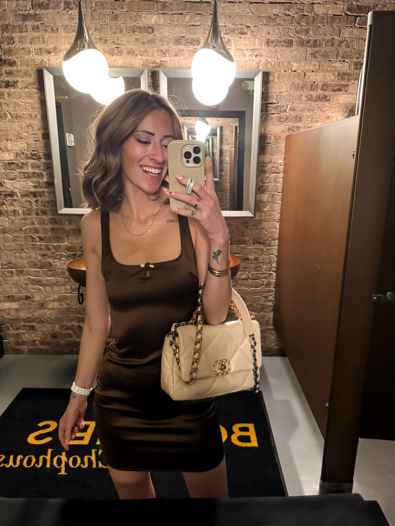 Date night style 
Brown satin slip dress is Zara
Quilted Chanel beige bag 