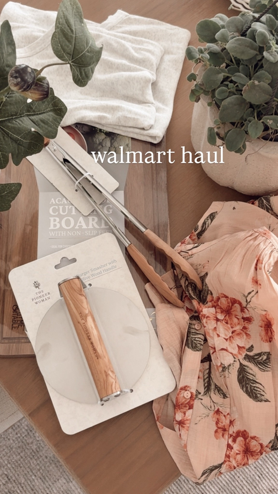 My walmart haul. The prettiest floral blouse, scalloped pot (on sale for $9), wood tongs, stainless steel burger press for making smash burgers, the softest tank tops, pretty wood cutting board and faux fig plant.

#LTKHome #LTKmomlife #LTKWorkwear