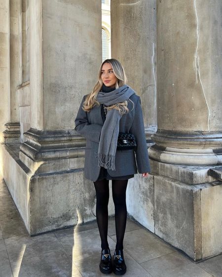Grey is really having a moment this winter. This monochrome look is so easy to throw together + looks super cute paired with sheer black tights. I've gone with an oversized grey blazer, cosy grey turtleneck + grey scarf with some of my fave black accessories.

#LTKstyletip #LTKeurope #LTKSeasonal