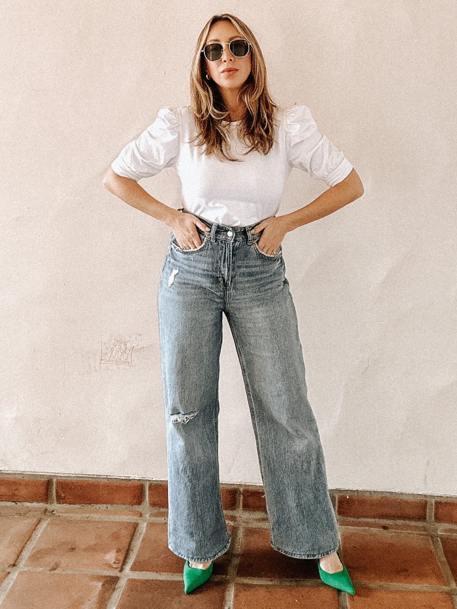 Welcoming spring with a little pop of color / and taking a break from neutrals with these bright green heels paired with a simple wide leg jean and white blouse 