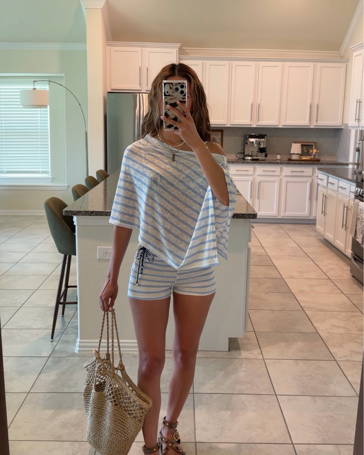 Did a little tanning + pool day today!! Such a cute set to throw over :) wearing xs in the top, and small in the bottoms

#LTKdayinmylife #LTKootd