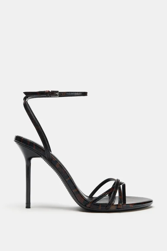 Heeled sandals. Patent-effect top. Animal print. Criss-cross straps at the front. High stiletto h... | Zara UK