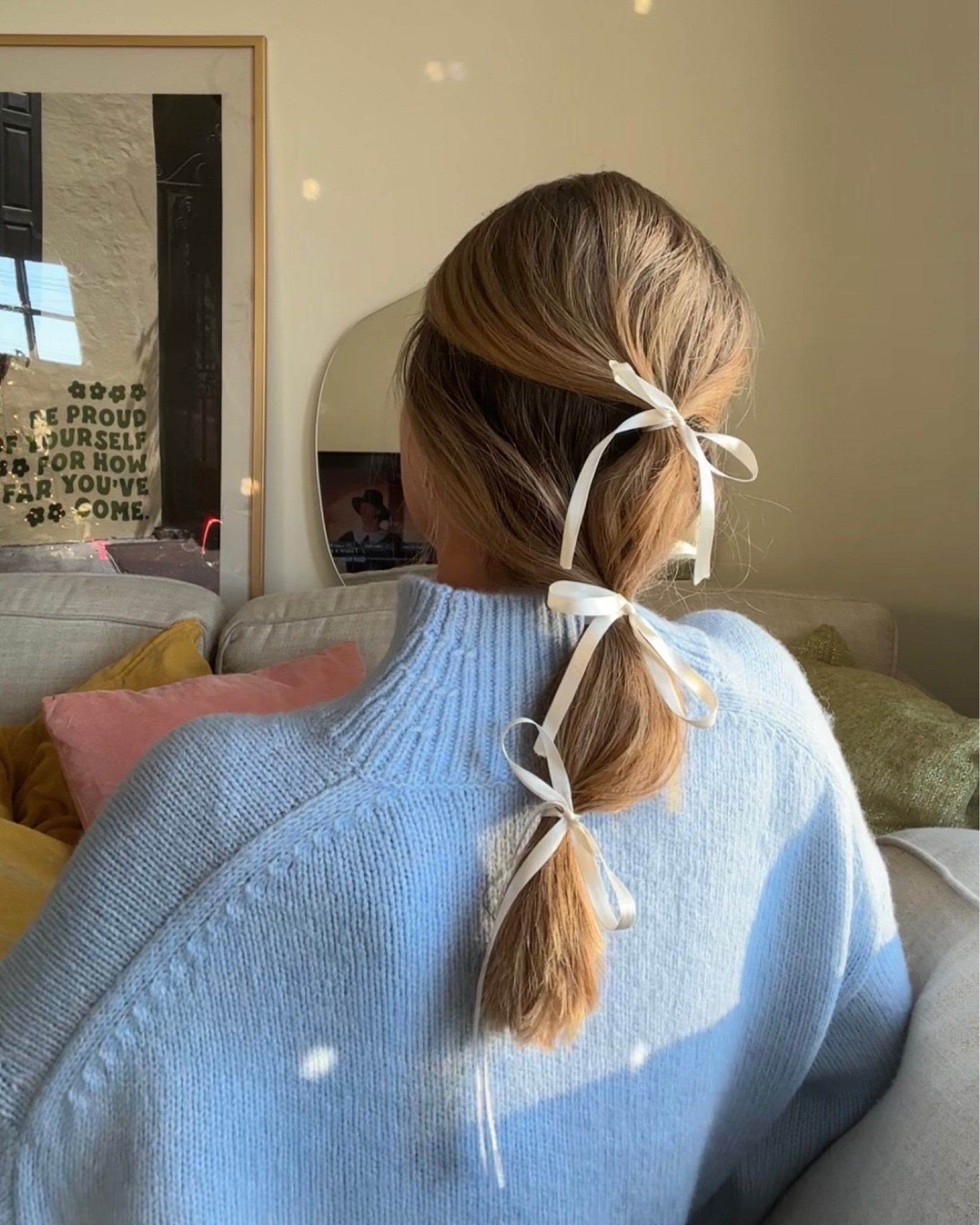 Soft & comfy winter cashmere oversized sweater from Everlane 🩵 trying different hairstyles with ribbon & I’m obsessed with this one!! The velvet couch pillows are from World Market, and the mirror in the back is from Amazon 🫶🏻 #winteroutfits #bowhairstyles #livingroomdecor

#LTKstyletip #LTKhome #LTKHoliday