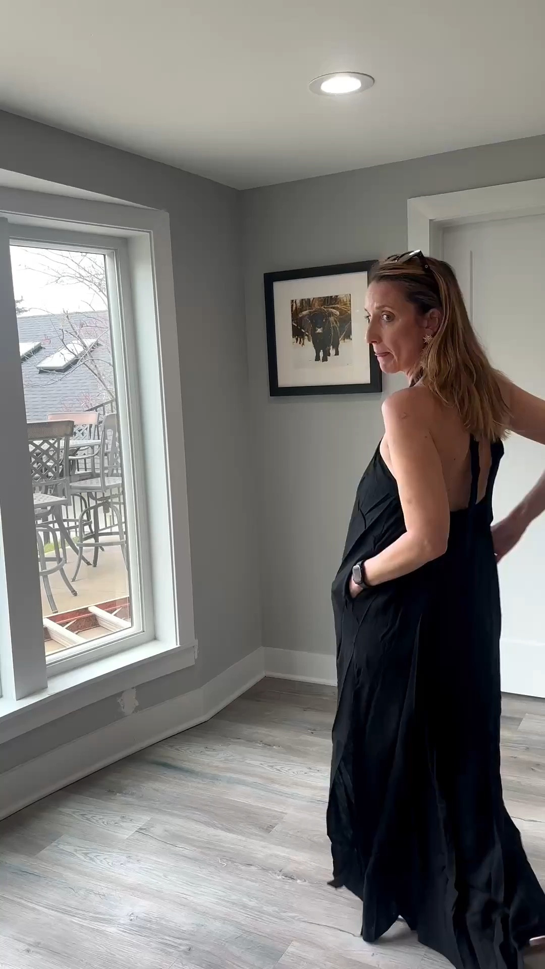 A floor-length black halter maxi is the ultimate canvas for your favorite spring accessories. ♟️✨ The keyhole neckline adds such a sophisticated touch to this breezy, effortless silhouette. You can shop this exact dress and my go-to white knotted slides at the link in my bio! #LittleBlackDress #MaxiDressStyle #SpringElegance #ShopTheLook

My Midnight Halter Style Breakdown
• The Dress: I’m wearing a floor-length, flowing maxi dress in a classic black fabric.
• The Neckline: The dress features a high halter neck that gathers into a central ring detail, creating a subtle keyhole effect.
• The Accessories: I’ve styled the look with oversized, dangling cream-colored earrings and classic black sunglasses perched on my head.
• The Footwear: I finished the ensemble with my favorite white flat slide sandals featuring a knotted strap detail for a high-contrast touch.
• The Vibe: This is the definition of "timeless resort"—it’s a sophisticated, versatile outfit that works perfectly for a tropical dinner or a polished spring event.

black maxi dress, halter neck dress, keyhole neckline, floor length dress, white knotted slides, flat slide sandals, statement earrings, monochrome spring style, elegant resort wear, effortless evening look, LTKstyle @VICI 

#LTKOver40 #LTKootd #LTKTravel

#LTKmomlife #LTKFestival #LTKOver40