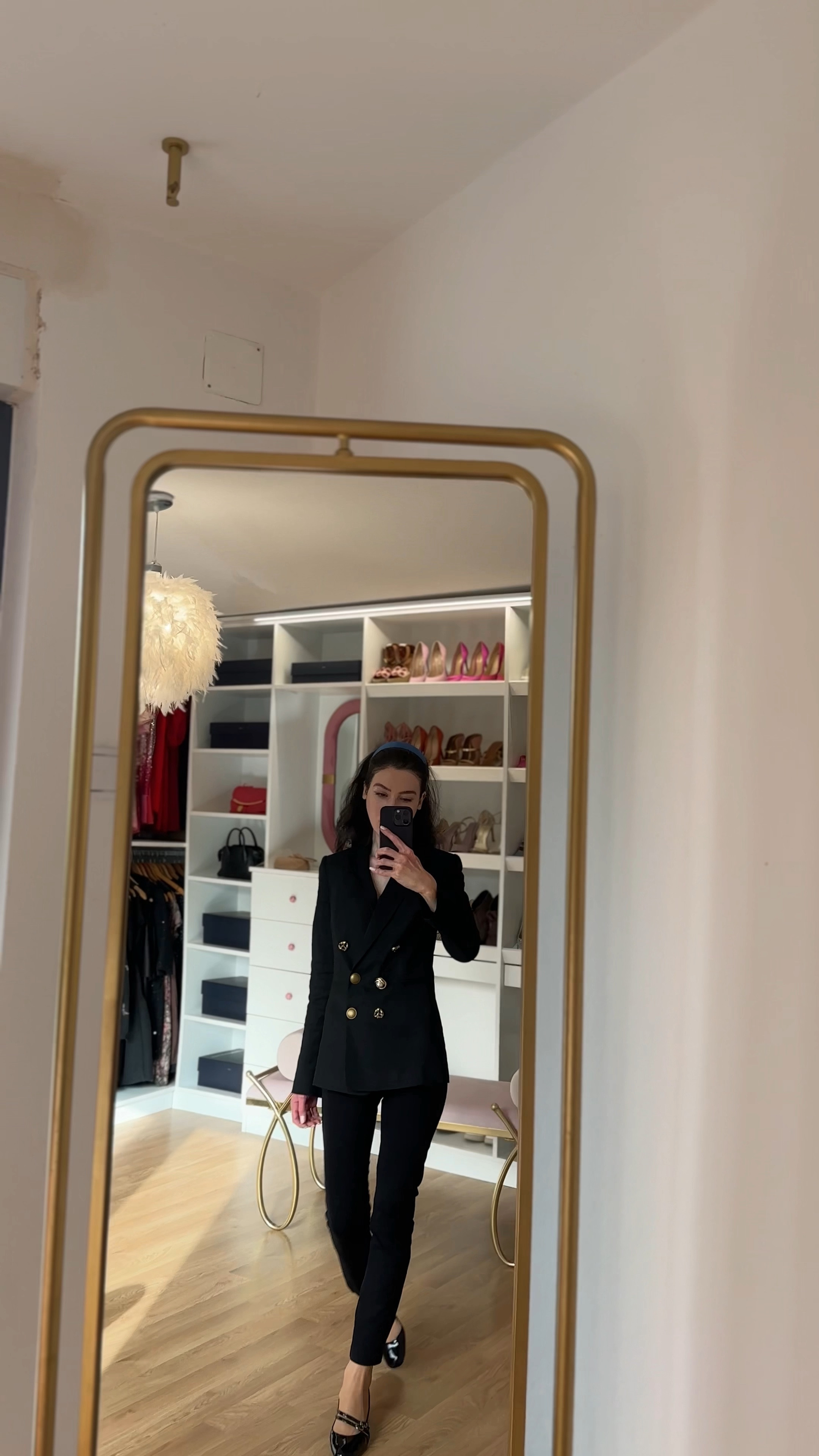 Spring power dressing and office siren is so fashionable for spring 2024! This look is all about owning the room with a touch of springtime flair. Obsessed with the sleek lines of this black skinny pantsuit – the fitted double-breasted blazer gives it a polished, powerful feel. A pop of color with the blue headband adds a touch of personality, perfect for the warmer weather. The statement shoes are the real showstopper – black patent leather Mary Jane pumps with multiple straps elevate the entire outfit. This is the ideal spring work outfit for women who want to look confident and ready to take on anything. Slay the boardroom with #springworkoutfit #springofficeoutfits #blackblazeroutfit #workwear #businessformal #outfitideasspring #LTKspring #LTKsale #workoutfit

#LTKVideo #LTKstyletip #LTKworkwear