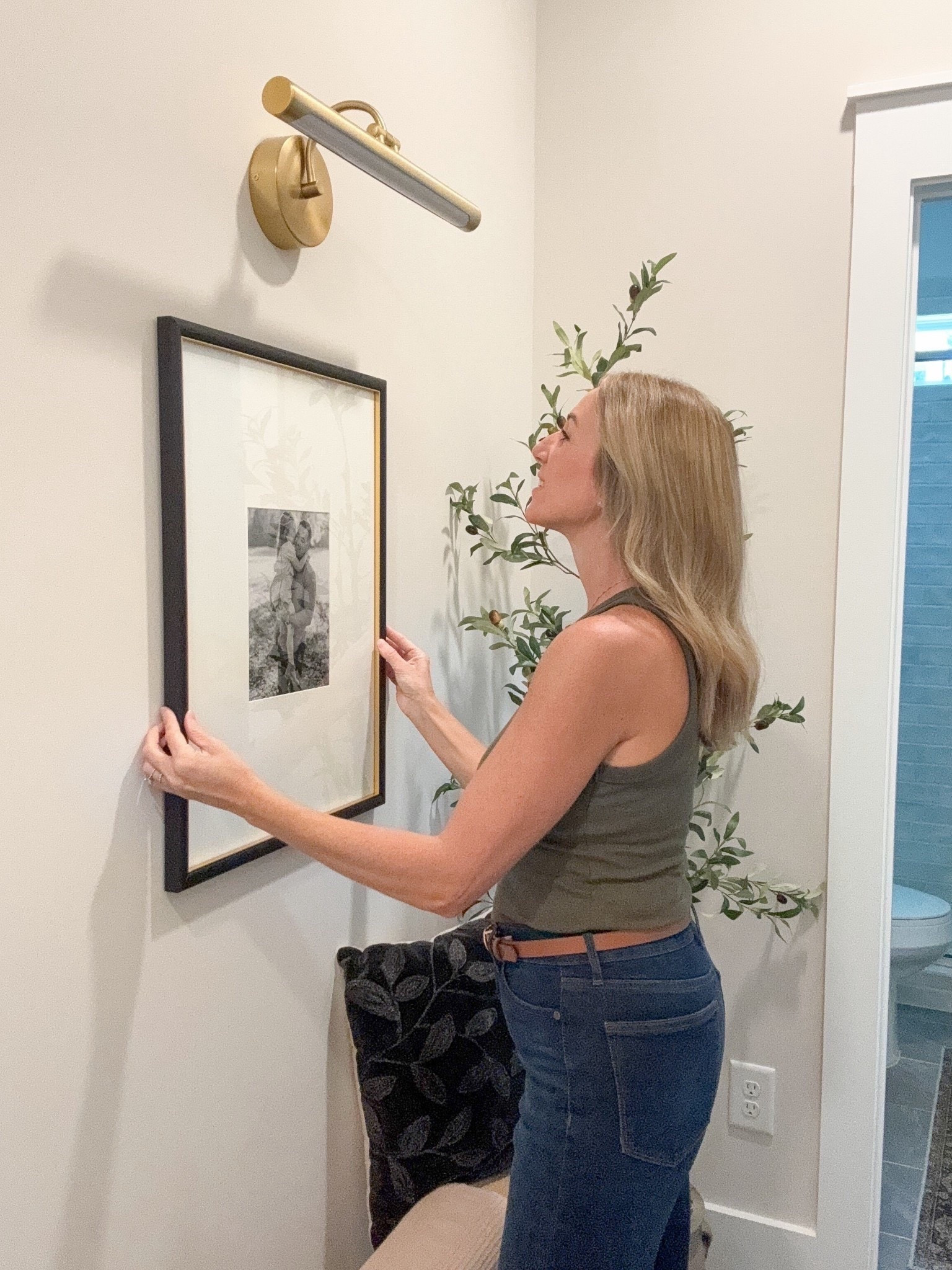 Hallways ideas, hallway inspo, battery operated picture light, light over frame, wall decor ideas, wall art, hallway transformation, frame, black frame, target frame, frame with picture light over it, cozy corner, gallery wall 

#LTKHome

#LTKHome