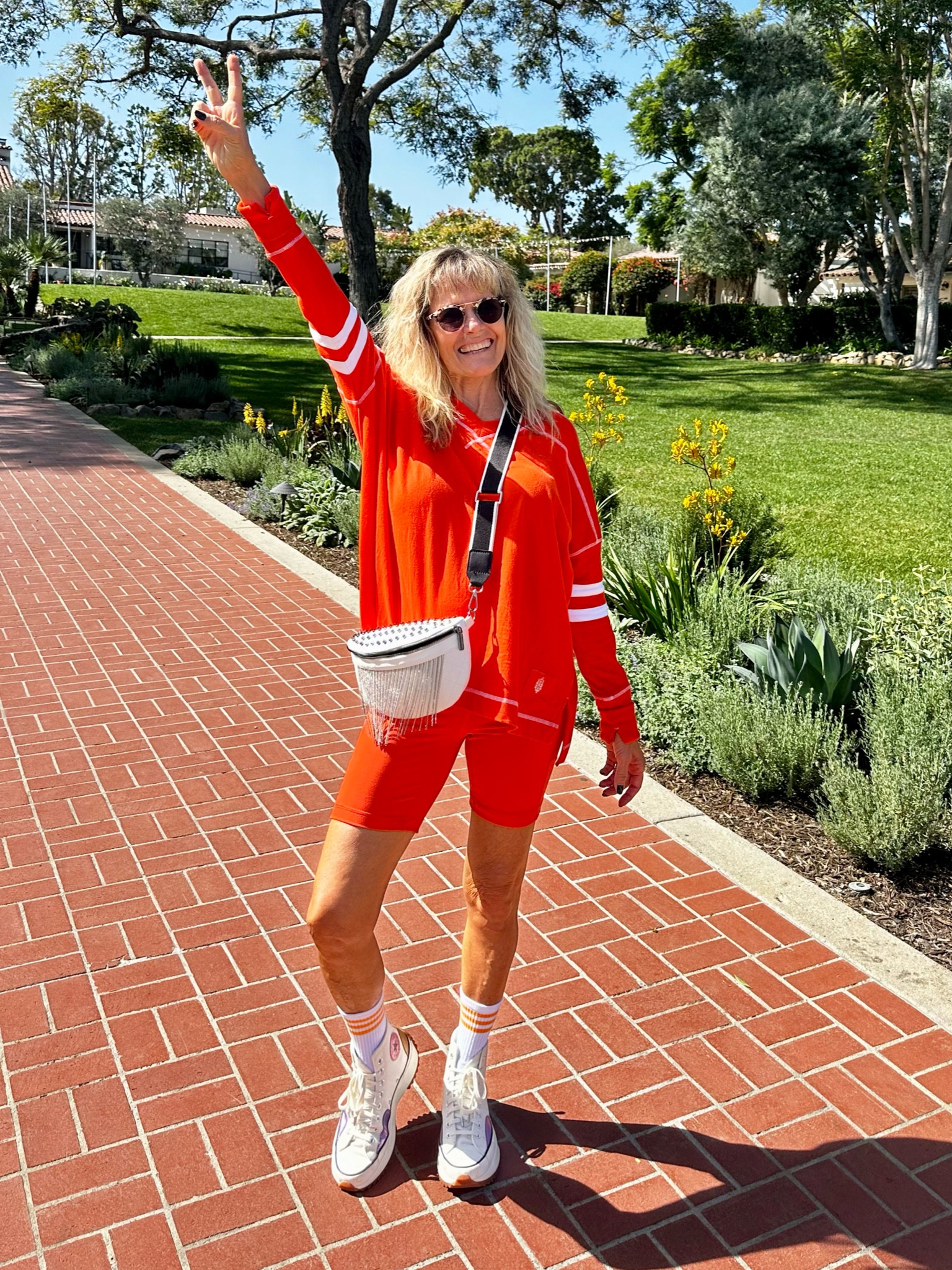Comfy outfit for spending the day outdoors in the sunshine ☀️.  I’m wearing size small in these super comfy biker shorts (with pockets), & I love the 7” length!  They come in lots of fun colors too! My long sleeve top from FP is sold out, but I’ll link a few other long sleeve tops. My striped crew socks come in a 5 pack for under $20!  These Converse platforms are still on sale!  They run tts. My crossbody bag is so fun, and is under $25! I put my baseball hat when we went to the beach later and will link it here too.
I’m also linking my sunglasses.  I had the sunglasses lenses replaced with my transition prescription lenses .  I get so many compliments on them!

LTK style tips, LTK fashion, LTK sale alert, LTK fit, LTK over 60, micro influencer, style influencer, wfh wardrobe, affordable fashion, sales & splurges, ways to style, outfit ideas, outfit inspiration, everyday outfit, ootd, casual outfits, casual style, daily looks, over 60, over 60 fashion, over 60 style, ageless style, fun fashion, comfy style, glamma, instafashion, summer fashion, summer style, summer outfit, vacation outfit, resort wear, travel outfit, fun summer fashion, wear what you love, Amazon finds, Amazon biker shorts, Free People, Free People tops, Amazon crew socks, Converse sneakers, Amazon crossbody bag, Vintage Havana baseball hat

#LTKShoeCrush #LTKFitness #LTKFindsUnder50