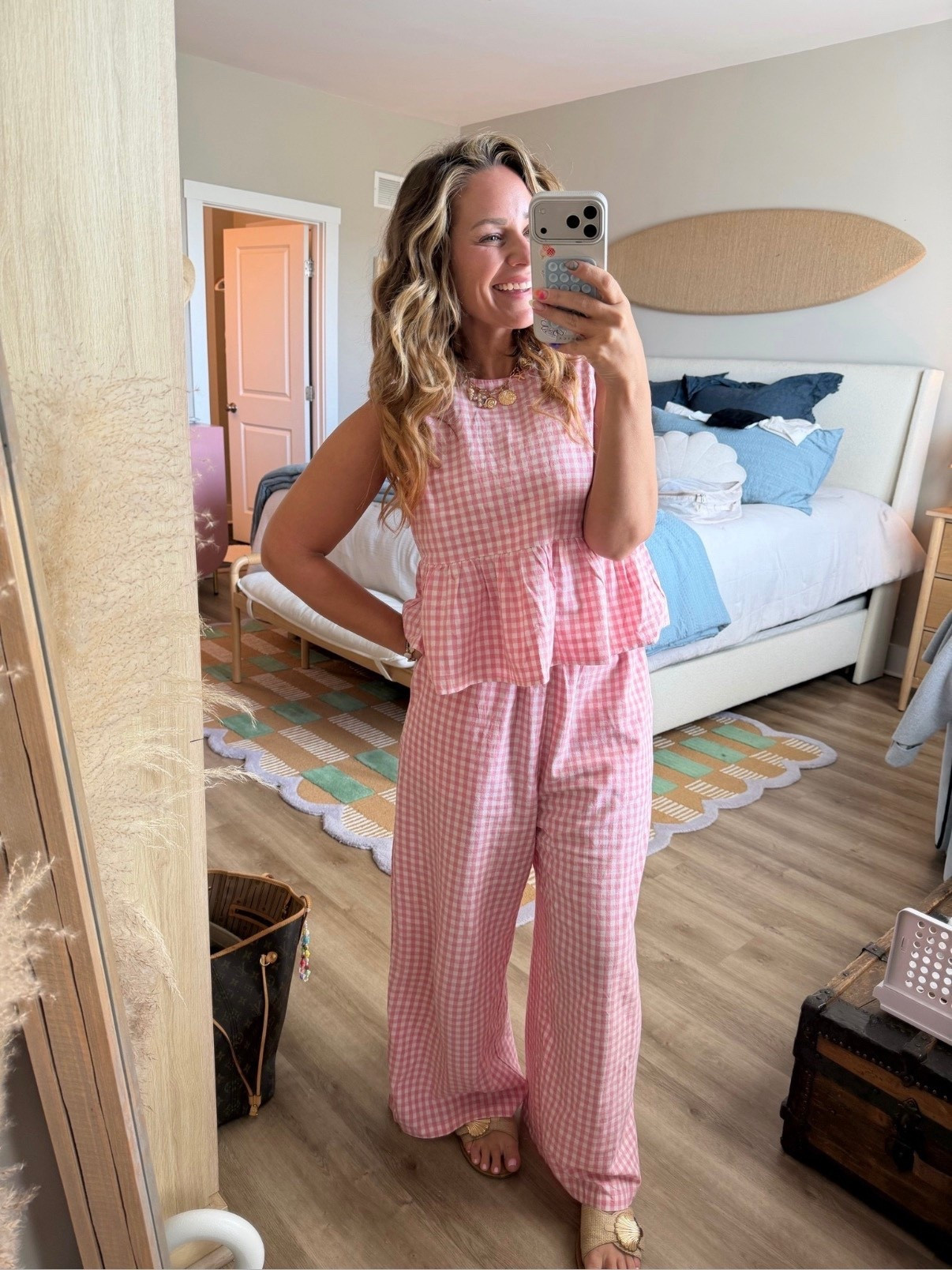 The set you’ll live in all summer 💗☀️ #liketkit

Matching sets = zero effort, maximum cute. This pink gingham top + wide leg pant set is lightweight, breathable, and so flattering (the peplum detail?? obsessed).

It’s one of those throw-on-and-go outfits that still looks like you tried ✨

Perfect for brunch, beach days, vacation, or just feeling put together on a hot day.

Details:
• Gingham peplum top (light + airy)
• Matching wide leg pants (flowy + comfy)
• Easy summer sandals

matching set, gingham set, pink outfit, summer outfit, vacation outfit, beach outfit, brunch outfit, wide leg pants, peplum top, feminine style, lightweight outfit, casual chic, coordinated set, mom style, Amazon fashion