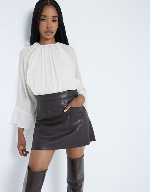 River Island faux leather patch pocket mini skirt in dark brown | ASOS | ASOS (Global)