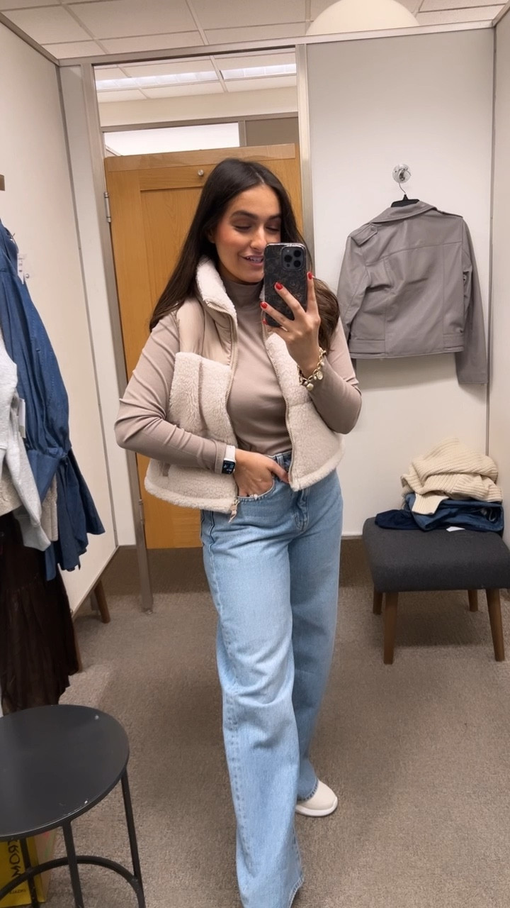 Loving this vest that is apart of the N sale!! Under $30!!

Vest: I’m wearing a size M in the vest. I’m going to size down on and order online because it’s just too cute to not have in my closet! It’s great neutral colors with Sherpa detail and zips all the way up! 

Undershirt: this color is warm ash brown and I’m wearing a size S. It has a subtle ribbed detail and is mock neck. So cute and versatile! 

Jeans: high waist and wide leg (size 27)
