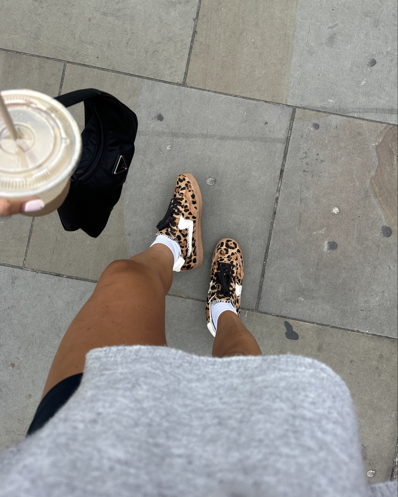 Leopard sneakers with gray a weather and black skort

#LTKstyletip #LTKtravel #LTKSeasonal