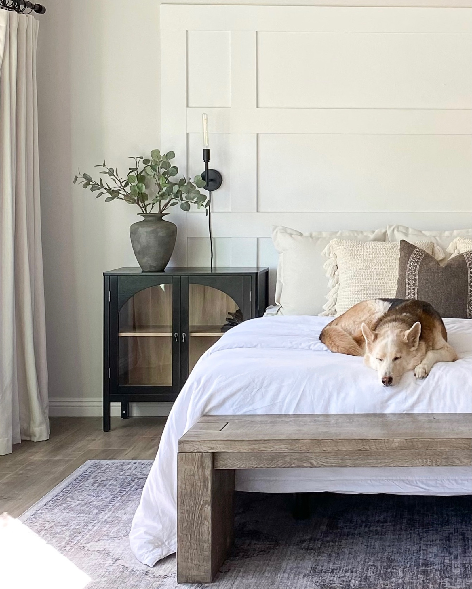 Get the look: cozy bedroom moments. Every bedroom needs texture and greenery to feel complete! You can add things like a terracotta vase, eucalyptus or olive stems, neutral drapes for softness, and a vintage-looking rug 😍 Linking some gorgeous vases and stems and my nightstands to recreate the look!

Nightstand. Vase. Faux stems. Eucalyptus. Terracotta vase. Blackout drapes. Ivory drapes. Olive tree. Faux tree. #LTKFind

#LTKhome
