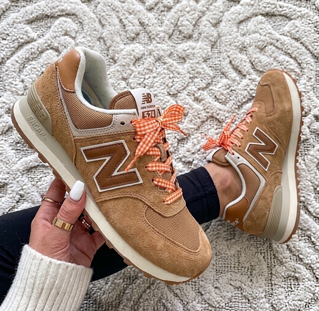 These New Balance 574s are the kind of sneakers that make every outfit look effortlessly put together 🤎. They run true to size, are incredibly comfortable, and the neutral color goes with everything from leggings to denim. I changed the laces for under $10!