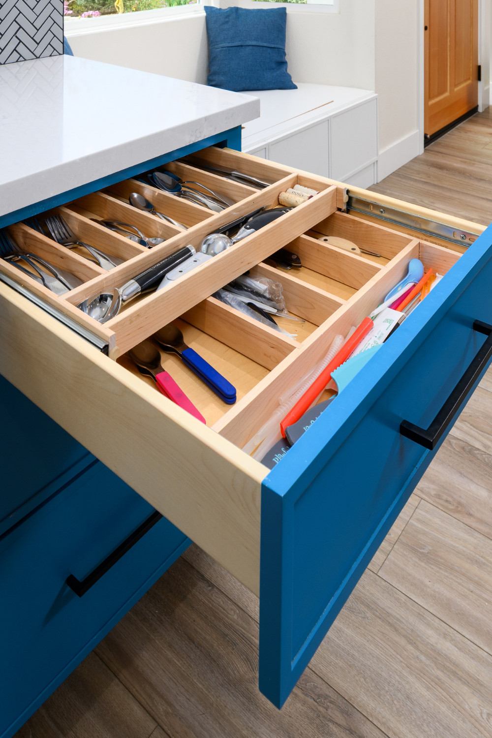 A well-designed kitchen isn’t just about looks — it’s about smart storage solutions that make everyday life easier. This custom utensil drawer features an integrated wood organizer to keep everything in its place, paired with bold blue cabinetry for a pop of personality.

As a design-build firm, we handle every detail—from space planning to cabinetry supply and installation—to create a kitchen that functions beautifully and reflects your style.

Ready to elevate your kitchen? Save this for storage inspiration!

\#KitchenOrganization #CustomCabinetry #UtensilDrawer #KitchenStorage #DrawerOrganizer #DesignBuild #KitchenDesign #BoldCabinetry #LTKHome #LTKKitchen #KitchenInspo #KitchenRemodel #CustomStorage #HomeRenovation #SemiCustomCabinetry #KitchenGoals #InteriorDesign #BlueCabinets #StorageSolutions #KitchenFunctionality #OrganizedKitchen #DrawerDesign #KitchenDetails #CaliforniaHomes #DreamKitchen
 

 #LTKHome