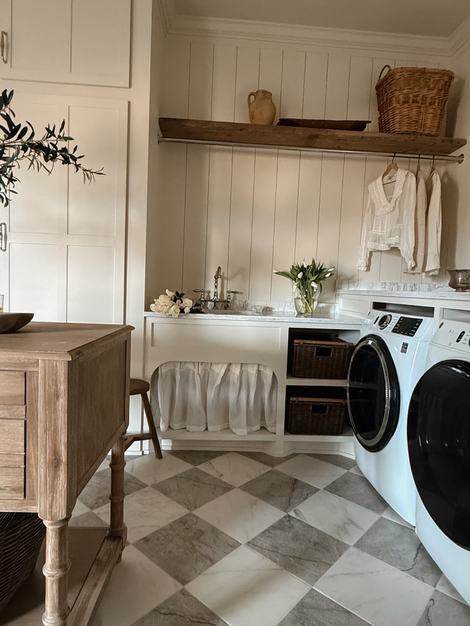 Laundry room links! Neutral laundry room. Home remodel. Checkered tile that’s affordable. Cafe curtain under sink. Amazon curtains. Front load washer and dryer. Clothing rod  

#LTKHome
