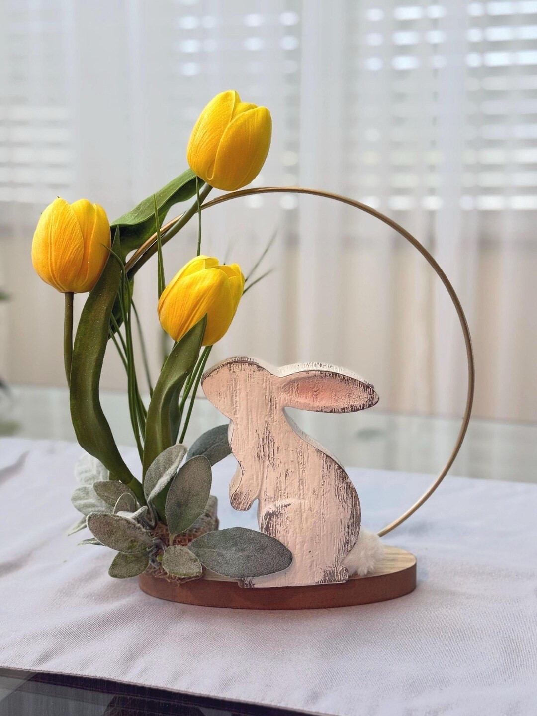 Celebrate the beauty of spring with this adorable Easter bunny centerpiece featuring a cheerful tulip arrangement. Handcrafted to bring warmth and seasonal charm to your home, this floral decoration makes the perfect addition to a dining table, mantel, or entryway. With its soft spring colors and sweet bunny detail, it’s a lovely way to brighten your space for Easter gatherings or enjoy a fresh spring vibe all season long. 🌷🐰

#LTKHome #LTKSpring #EasterDecor #SpringCenterpiece #TulipArrangement #EasterTable #FarmhouseDecor #SpringHome #SeasonalDecor #HomeDecorFinds

#LTKHome #LTKSeasonal #LTKSpringSale