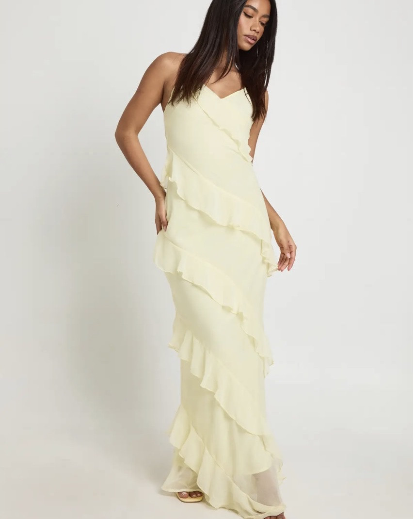 Luxurious flowing chiffon fabric
Elegant feminine ruffle details
Flattering column silhouette
Strappy design for versatility
Floor-length maxi sophistication
Description
Flowing chiffon maxi dress with cascading ruffle detail for movement and dimension
Elegant spaghetti straps and flattering V-neckline
Asymmetric tiered ruffles create a striking visual effect
Floor-length design with subtle flare towards the hem
Lightweight, floaty fabric perfect for evening occasions
Make an entrance in this show-stopping chiffon maxi dress, designed to turn heads at any evening event. The diagonal ruffle detailing creates a beautiful sense of movement as you walk, whilst the delicate spaghetti straps and V-neckline offer a refined touch of femininity. Style with minimal strappy heels as shown for an effortlessly chic look that lets the dress take centre stage. This statement piece works brilliantly for cocktail parties, summer weddings or special nights out. Add a clutch bag and delicate jewellery to complete the ensemble. The lightweight chiffon fabric drapes beautifully around your silhouette, creating a graceful effect that's both contemporary and timeless. This Boohoo dress embodies the perfect balance between dramatic design and wearable elegance for the fashion-forward woman.
@boohoo

#LTKSaleAlert #LTKdayinmylife #LTKU
