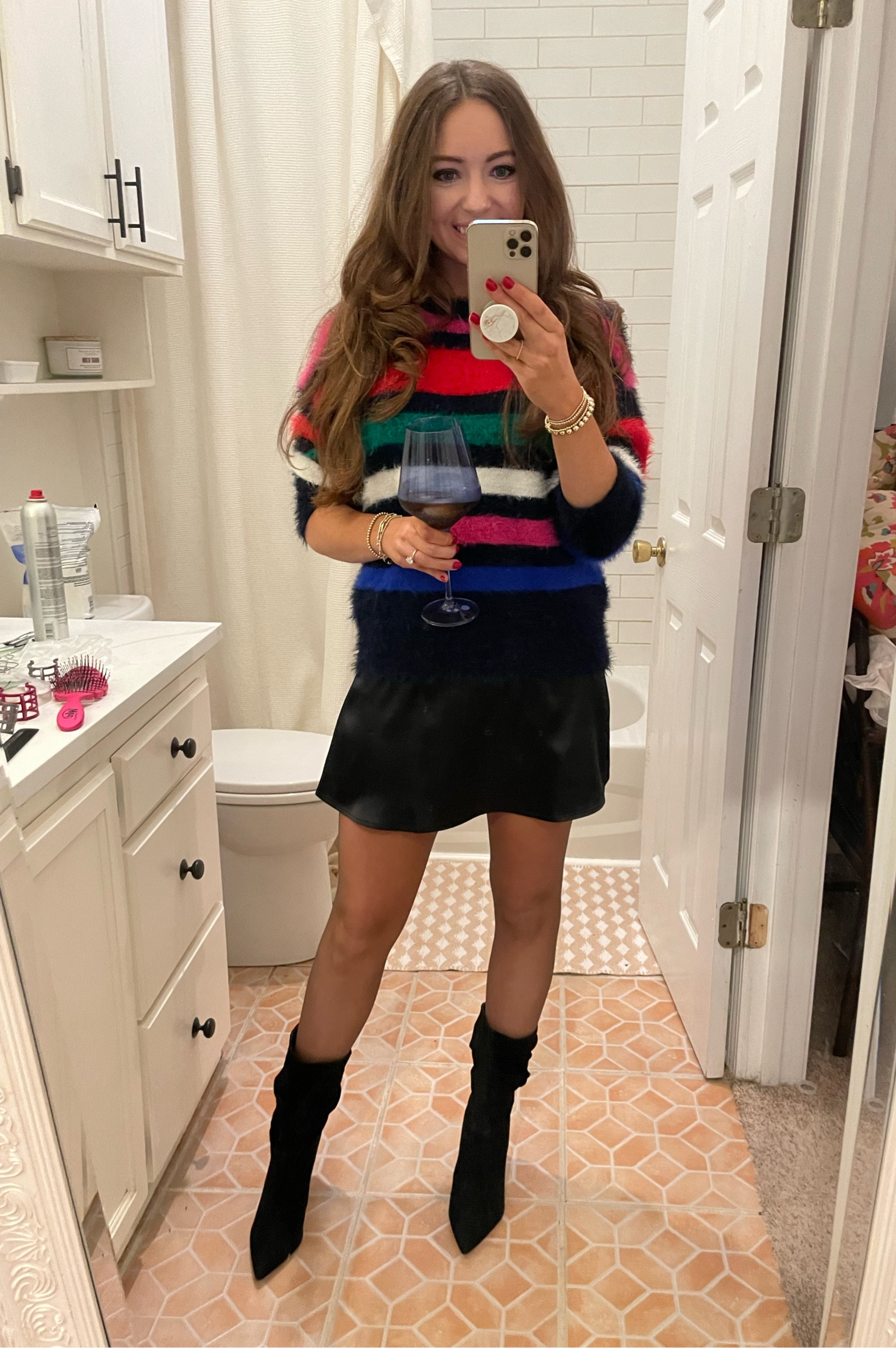Target colorful sweater is from last year, sorry!! I’ll link it anyways though. Satin mini skirt is from Amazon! Has a comfortable waistband. I’m 5’5 and i sized up to a medium because i didn’t want it to fit tight. Schultz Ashlee heeled bootie. And yes i drink my coke from Estelle wine glasses! 😂

#LTKfindsunder50 #LTKparties #LTKshoecrush