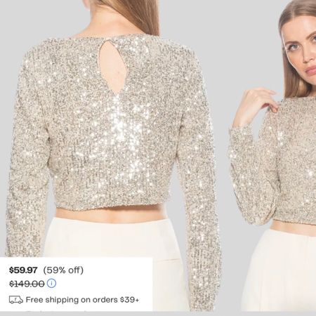 Ari Sequin Long Sleeve Crop Top is currently on sale 50% off. This too is also available in black.

#LTKfindsunder100 #LTKHoliday #LTKsalealert