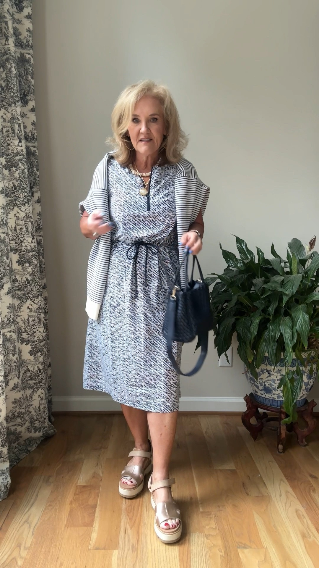 Talbots dress super lightweight perfect for European travel, amusement parks, Fourth of July picnics, and parades. I did size down to a small.
Spanx air essentials crewneck in this really pretty stripe. I’m wearing a size large. 15% off your order for new customers only with code.  NANETTEXSPANX 
Sandals are very comfortable and found at a discount  by sorel. They’re sturdy and I could walk for miles in them.

My purse in blue has been restocked!

#LTKOver40 #LTKTravel #LTKFindsUnder100