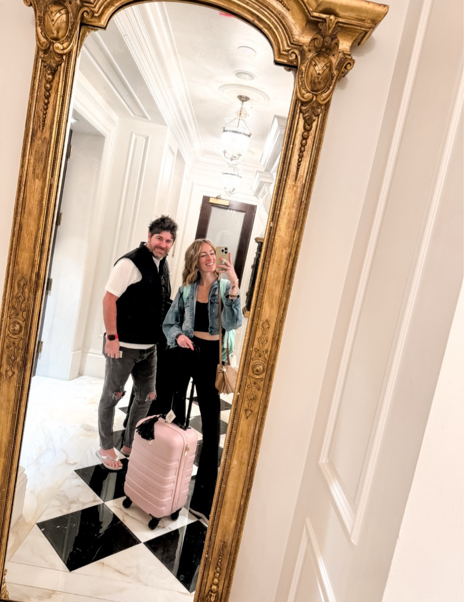 Travel outfits, and what to wear on an airplane, airport style and outfit ideas, carry-on, roller bag, and black flare leggings