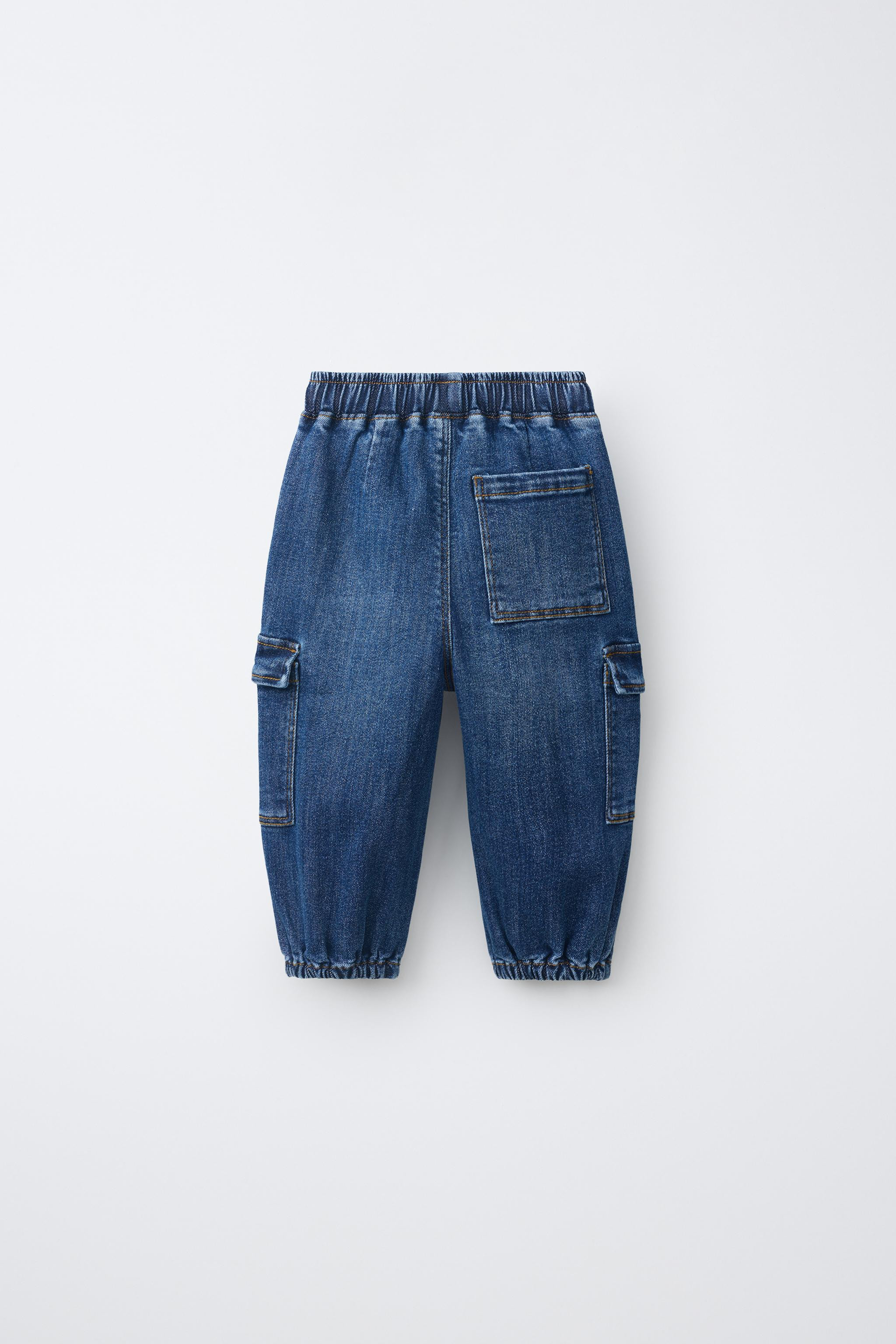 Cargo jogger-style jeans with elastic waistband and adjustable front drawstrings. Patch pockets o... | Zara US