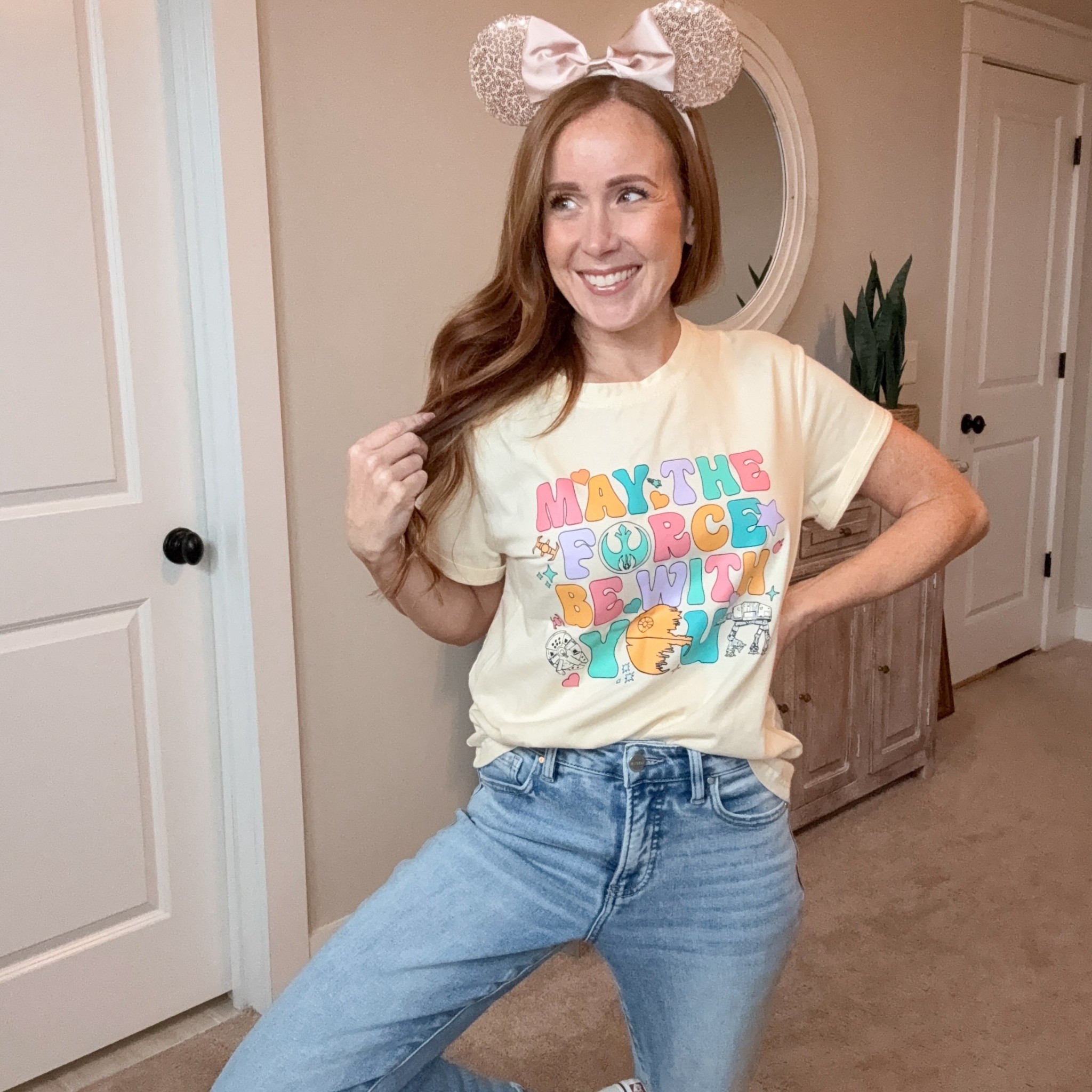 Hollywood Studios ready! I got this “May the Force be with you” tshirt in my normal size. For reference I’m 5’3”, 115lbs, and I grabbed a size small. It comes in navy blue and heather grey as well. It’s stretchy and lightweight, washes and dries beautifully. 
Note: My jeans are “Leo Risen” jeans from Wild Oak Boutique.

#LTKmomlife #LTKootd #LTKOver40