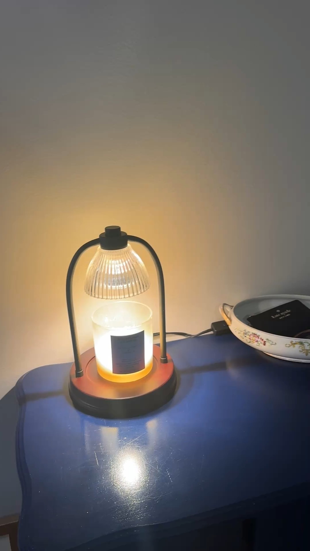 I am officially obsessed with this Better Homes & Gardens candle warmer from Walmart! Not only is it a stunning piece of decor, but it’s also a total game-changer for making your candles last 3x longer. No flame, no soot, just the perfect cozy glow. 🕯️
It’s under $25 and looks way more expensive than it is. Perfect for the bedside table or a kitchen nook! It would also make a perfect Valentine’s Day gift too!! 
Shop the look in my bio! #WalmartHome #valentinesday #CandleWarmer #CozyAesthetic #LTKHome 

#LTKmorningroutine #LTKmomlife #LTKValentine