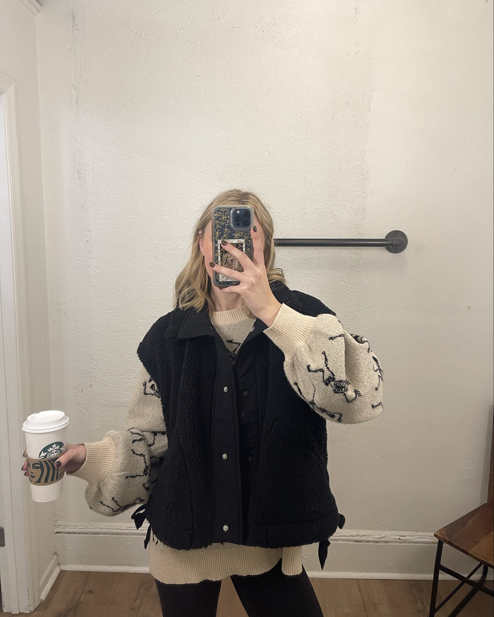 Halloween ootds for work💀🖤🕷️ styling a festive sweater two ways! (my 
sizing: small in the sherpa vest, xs in the leggings, large in the sweater, and US 4 in the denim skort)

#LTKActive #LTKHalloween #LTKStyleTip