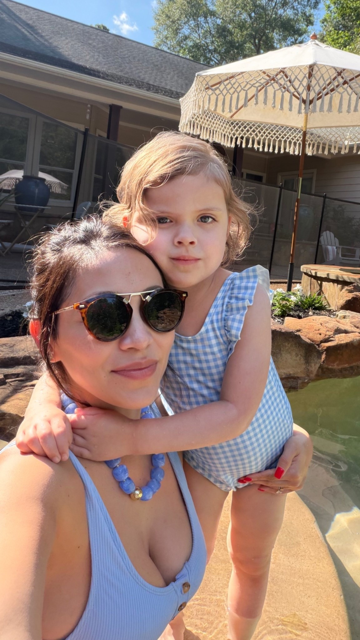 Henley blue swimsuit 
Toddler gingham swimsuit 
Blue beaded necklace 
Boho beach umbrella 
Amazon summer finds

#LTKSwim