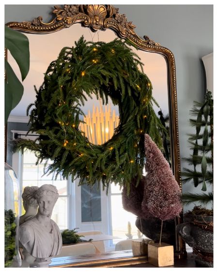 Here is a sneak peek of my Dining Room, this is the Real Touch Wreath with a light set added. 
.
#fauxgarland #fauxgreenery #christmasgreenery #christmaswreath 

#LTKhome #LTKHoliday #LTKSeasonal