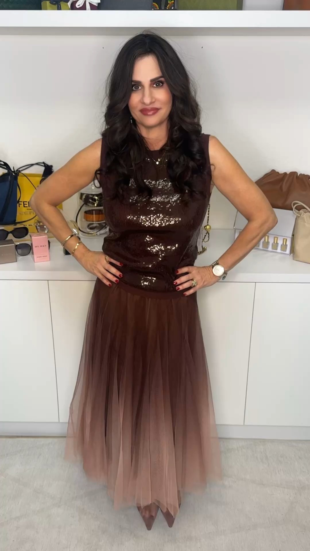 This sequin top is so well made and pairing with a tulle skirt is perfection! Wearing a sm top and XS skirt . Heels are on sale . 

#LTKHoliday #LTKSaleAlert #LTKOver40