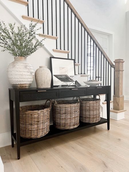 Entryway styling, entryway decor, home decor, cane console, cane sideboard, vase, wall art, coffee table books

Follow my shop @jessicaannereed on the @shop.LTK app to shop this post and get my exclusive app-only content!

#liketkit 
@shop.ltk
https://liketk.it/4fAm2

#LTKHome #LTKStyleTip #LTKFindsUnder50