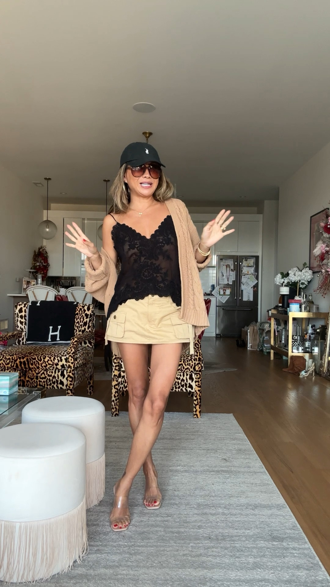 Transitional fall outfit. Lace top, cargo skort, Amazon sunglasses and sunglasses, cable sweater. Al a size small 

#LTKStyleTip #LTKFindsUnder100