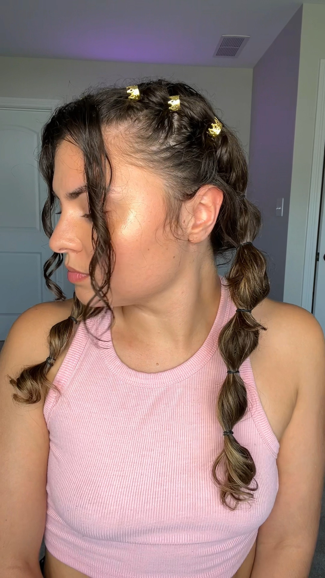 Bubble braid hairstyle on curly hair 

#LTKbeauty #LTKstyletip