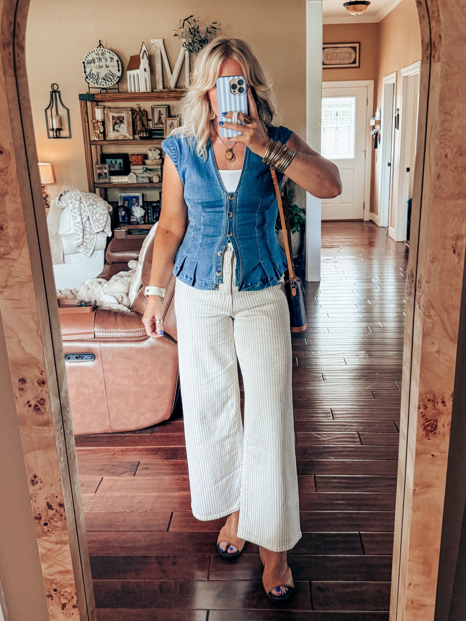 This denim top is so ADORABLE! I’m obsessed and yes it wasn’t cheap but it’ll be one I get my wear out of because it’s so GOOD! I did find the look for less but idk how good it is yet because there are no reviews. I’m in my true size medium in the top and these jeans from 🎯 come in a lot of colors and I size up because they run small. My shoes are older and I can’t link them. They are OTBT though. 

*Necklace with coins save with code MANDIE20 

#LTKOver40 #LTKStyleTip #LTKFindsUnder100