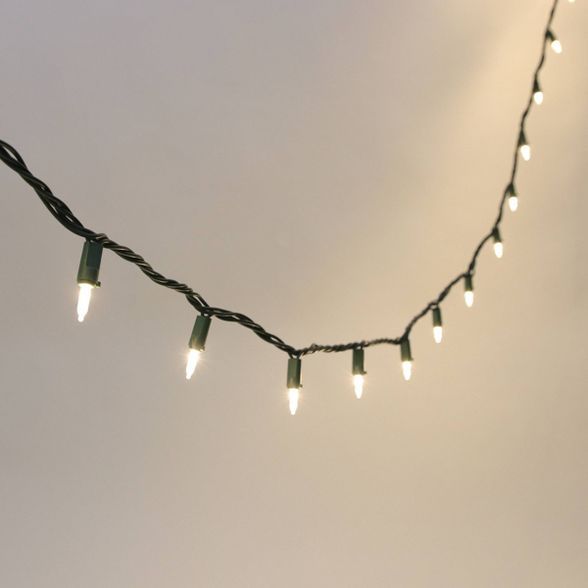 Philips 200ct LED Super Bright Mini Spool String Lights Warm White with Green Wire | Target