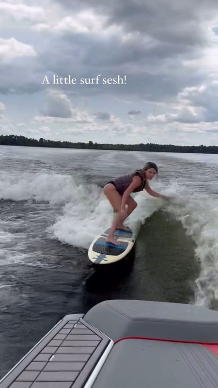 Surfing it out behind the boat! I linked my life jacket! 