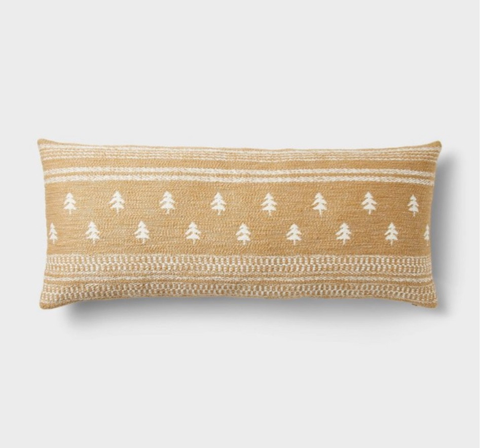 Oversized lumbar throw pillow with mini Christmas trees 

•	Jacquard fabric with woven pattern
•	Cotton-rich exterior with soft filling
•	34in x 14in rectangular silhouette

#LTKHome #LTKSeasonal #LTKSaleAlert