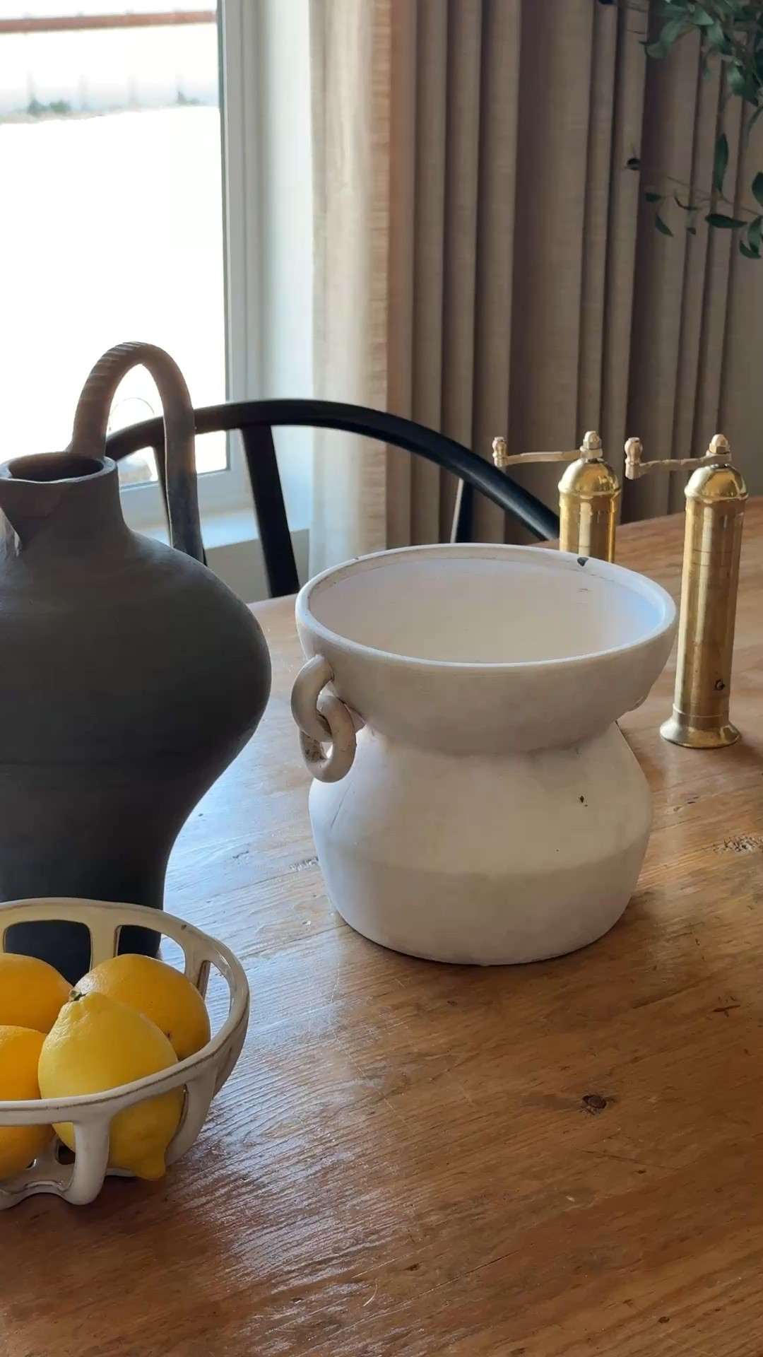 some of my favorite home decor pieces include this black handled jug and cream colored vase with two handles, brass salt & pepper mills and the perfect bowl to display fruit in! 

#LTKHome #LTKWatchNow
