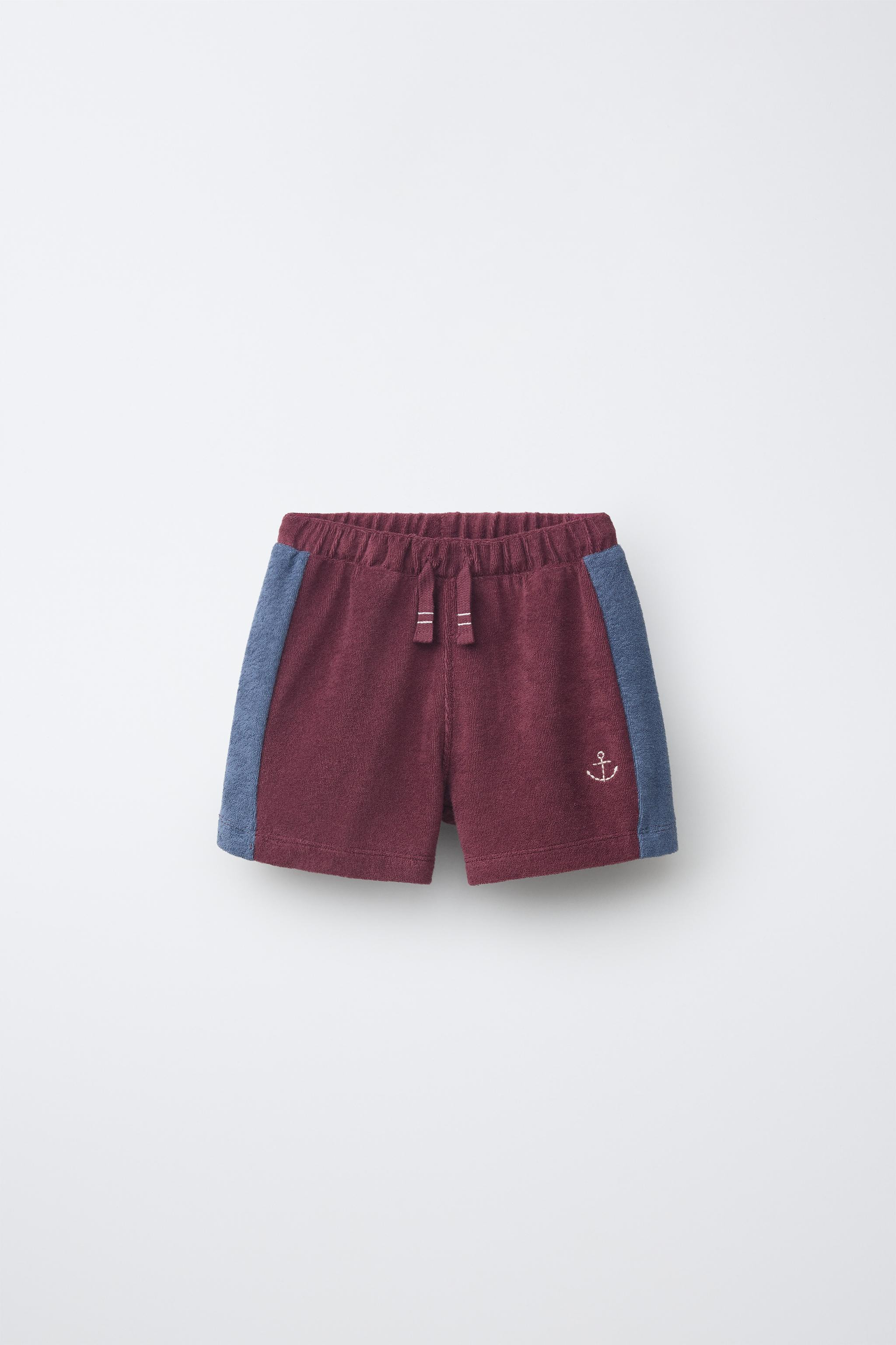 DescriptionContentsMeasurementsShorts with elastic waistband and adjustable front drawstring. Anc... | Zara US