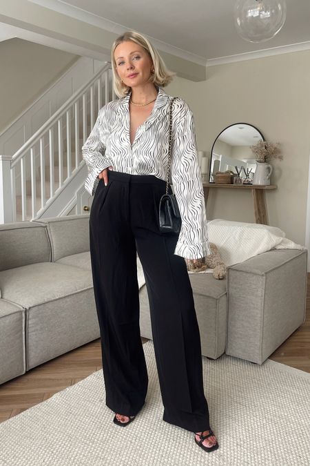Black wide leg trouser outfit idea! A dressy way to style wide leg trousers with a satin shirt and heels  